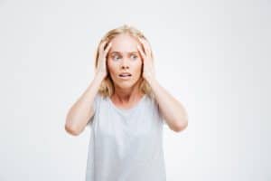 Person holding head