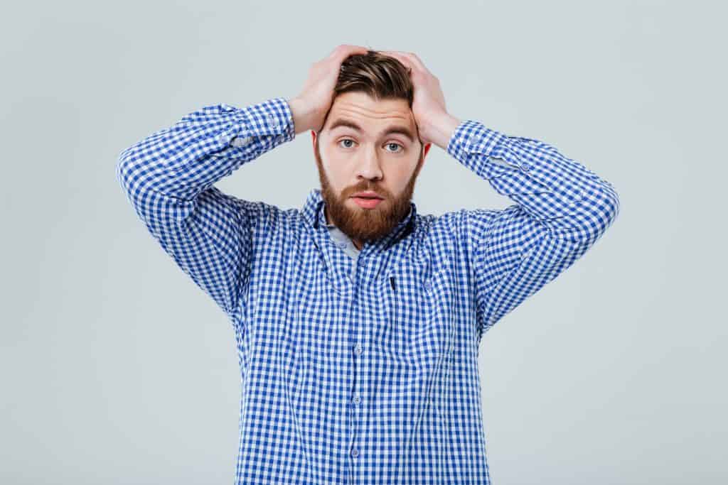 Person holding head