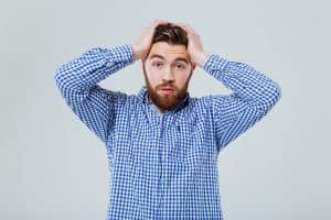 Person holding head
