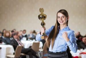 Person holding a trophy