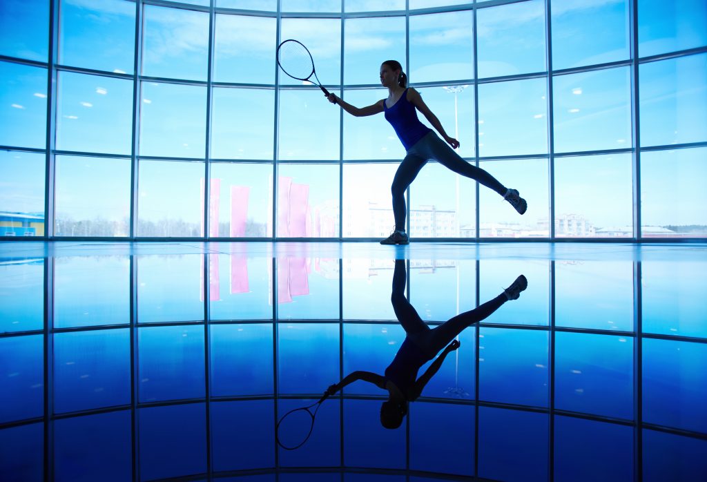 Person playing tennis