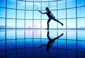 Person playing tennis