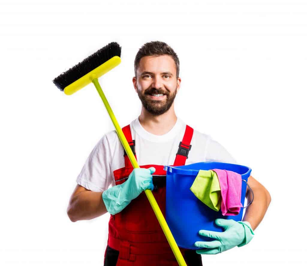 Person holding cleaning supplies