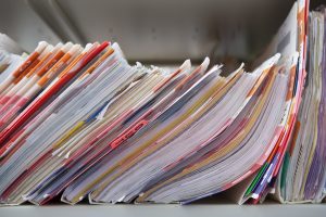 Medical records on a shelf
