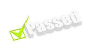 Checkmark next to the work "Passed"