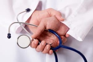Doctor holding stethoscope