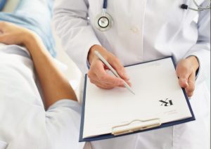 Doctor writing medical note