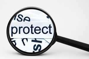 "Protect" under magnifying glass