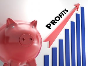 Piggy bank next to a bar graph