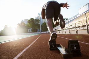 Runner staring off of block