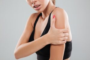 Person holding arm
