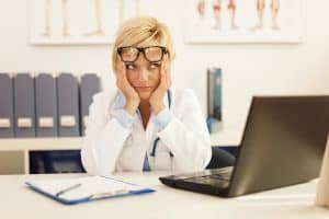 Doctor sitting at a desk