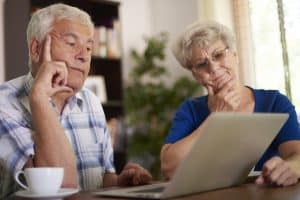 Older people looking at computer