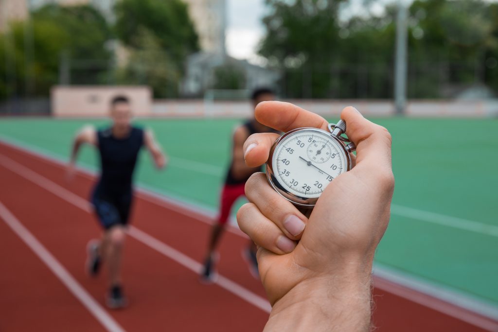 Person timing runners