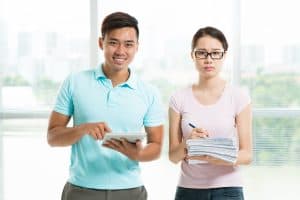 People reviewing documents