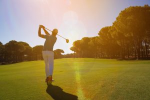 Person playing golf