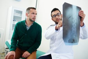 Doctor reviewing radiology scan