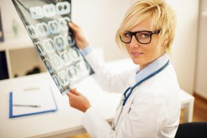 Doctor reviewing radiology scan