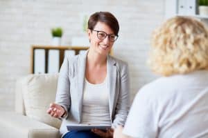 Doctor talking with patient
