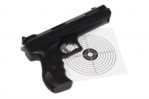 Firearm laying on a target