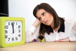 Person looking at a clock