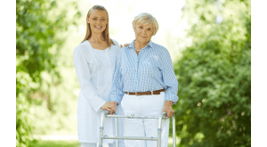 Caregiver walking with patient