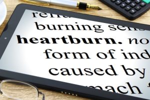 Tablet with the word "heartburn" on the screen