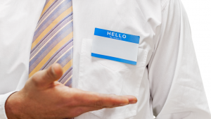 Person wearing a name blank name tag