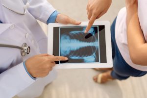 Doctor reviewing radiology scan