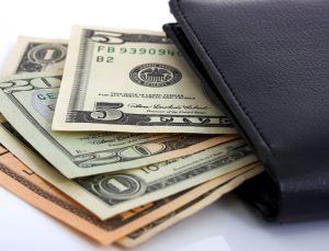 Money sticking out of wallet