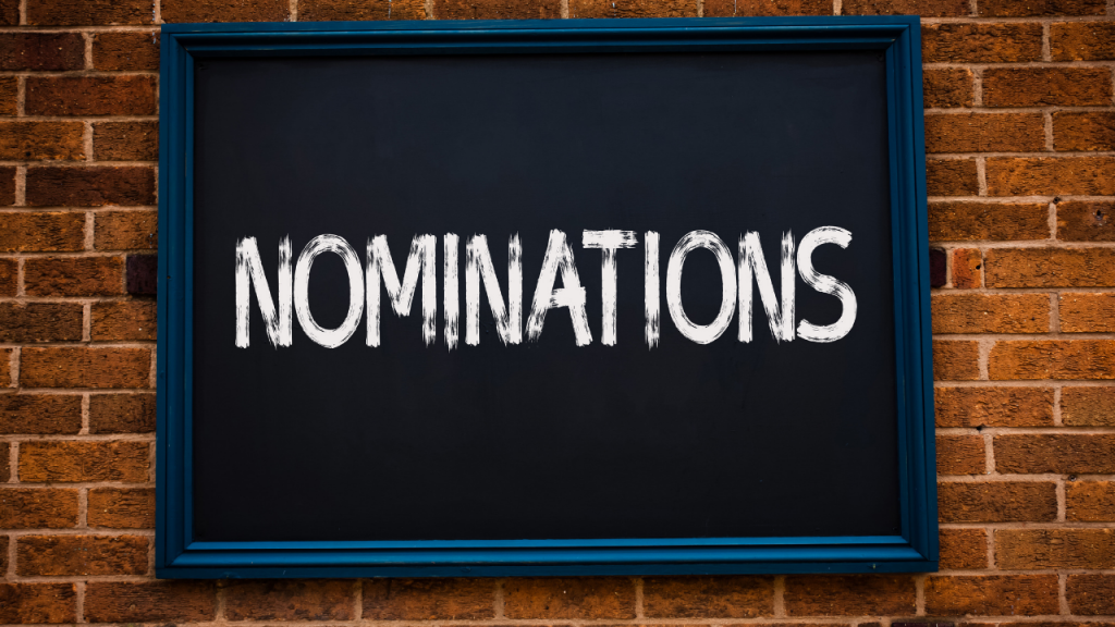 Nominations written on a chalkboard