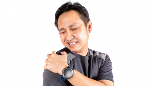 Person rubbing shoulder