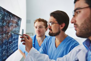 Doctors reviewing radiographic images