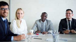 Business people sitting around a table