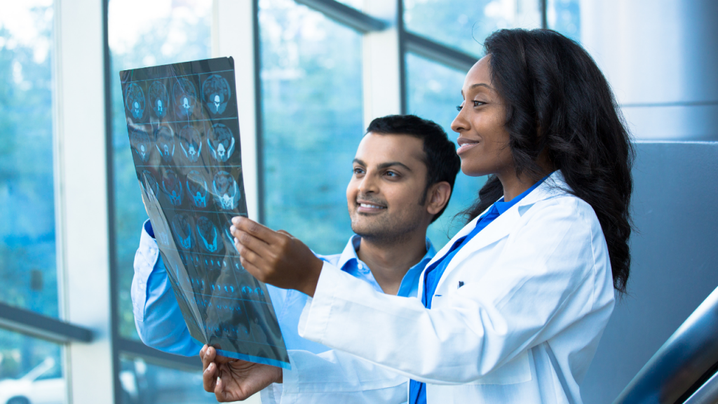 Doctors reviewing PET Images