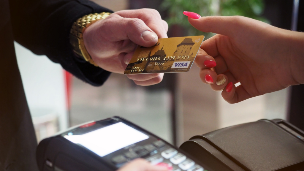 A person making a payment with a credit card