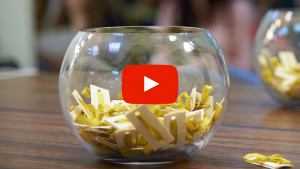 Slips of paper in a bowl for a drawing