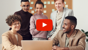 Business people looking at a computer