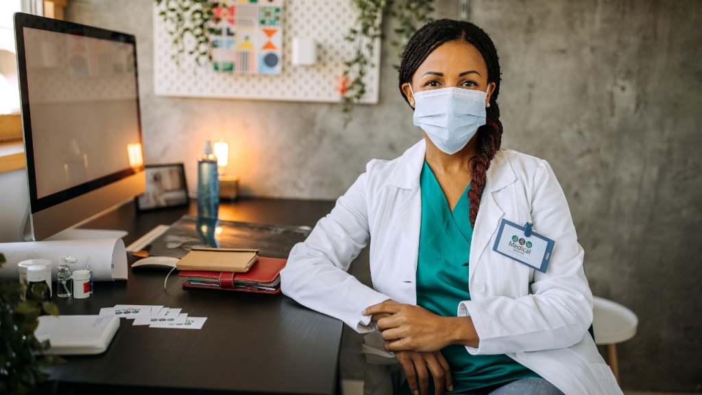 Doctor sitting at a desk