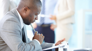 Business person reviewing forms
