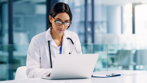 Doctor using a laptop