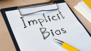 "Implicit Bias" written on paper
