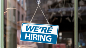 "We're Hiring" sign