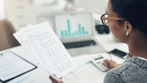 Person reviewing financial docu
