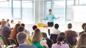 Person presenting at a meeting