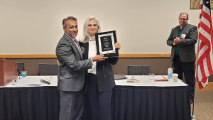 Adrienne Hersh receiving the Chiropractic Champion of the Year Award