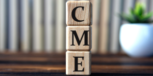 "CME" stacked blocks