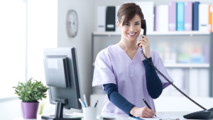 Medical receptionist talking on the phone