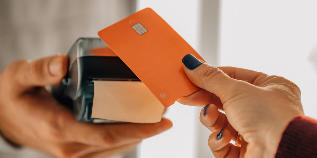 Person making a credit card payment