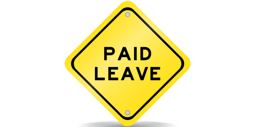 "Paid Leave" sign representing the Paid Leave for All Workers Act.
